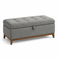 Banc de rangement en tissu gris avec pieds en bois
