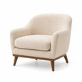 Fauteuil en laine bouclée beige avec pieds en bois massif